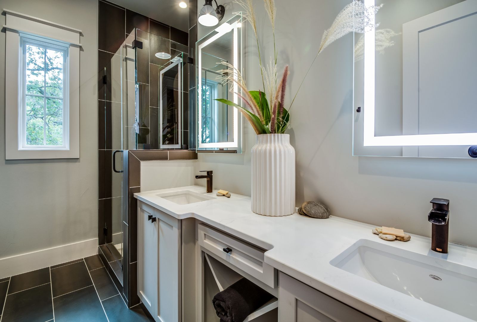 LED lighted mirrors in newly designed bathroom