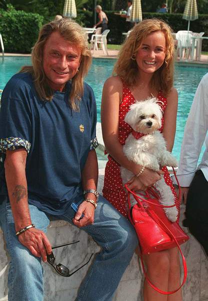 Johnny et Laeticia Hallyday avec leur chien