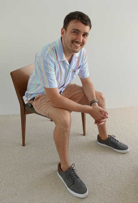 Beautiful man sitting on a chair