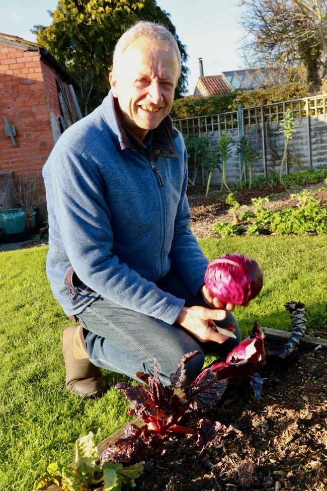 Charles with heart of red cabbage cut in February
