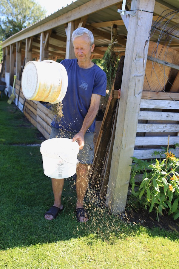 Charles winnowing seeds in a breeze