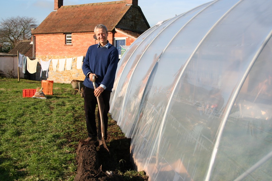 Filling a trench for new polythene at Homeacres, January 2013