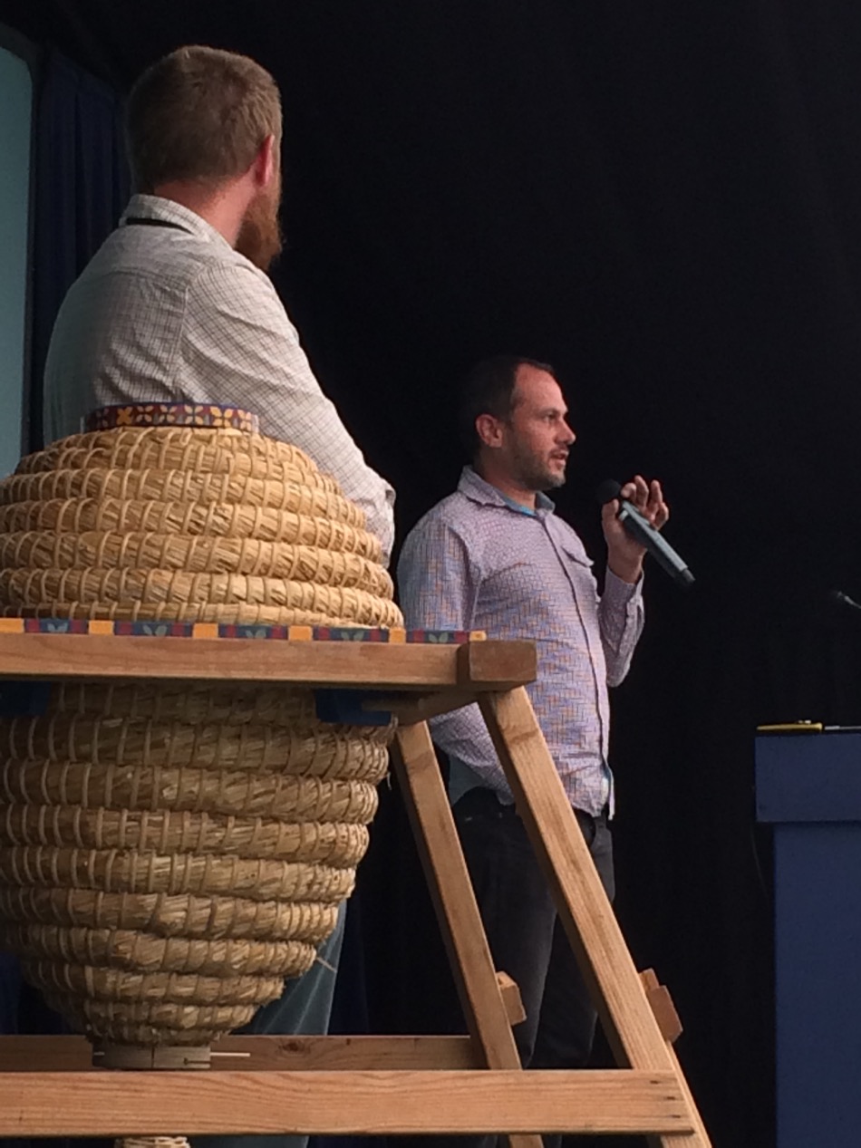 Robin Baxter speaking at the conference, and a hive made by prisoners