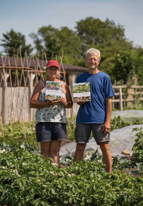 Steph and Charles with books for prizes