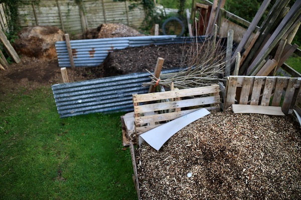 Piles of wood chip and mature compost