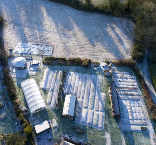 Drone view of Homeacres in frost and snow