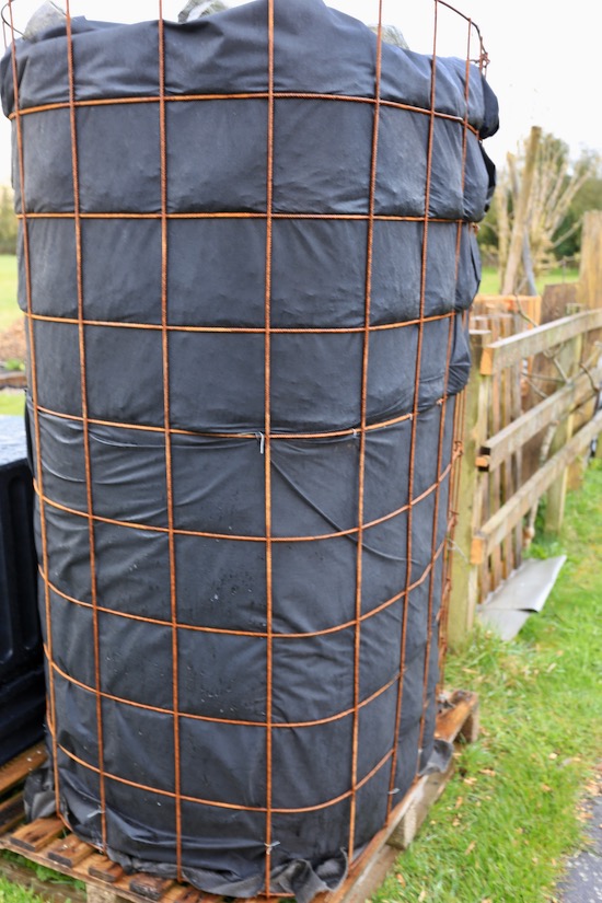 Weldmesh and landscape fabric hold about a ton of woodchip