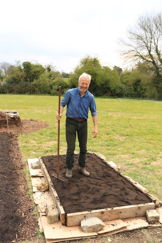 Now 6 sacks compost on top & treading