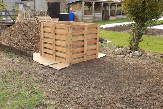 Wired at the corners, new compost heap from pallets