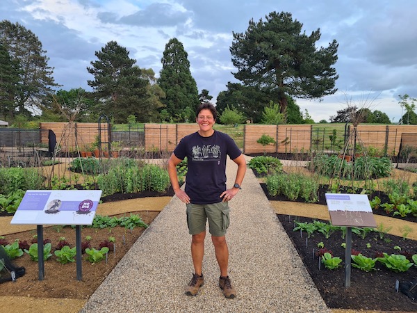 RHS Sheila Das proudly in the new edibles garden at Wisley