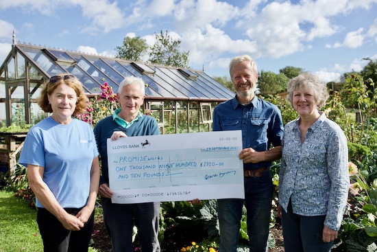 Promise Works receiving £1910 from Charles' open day