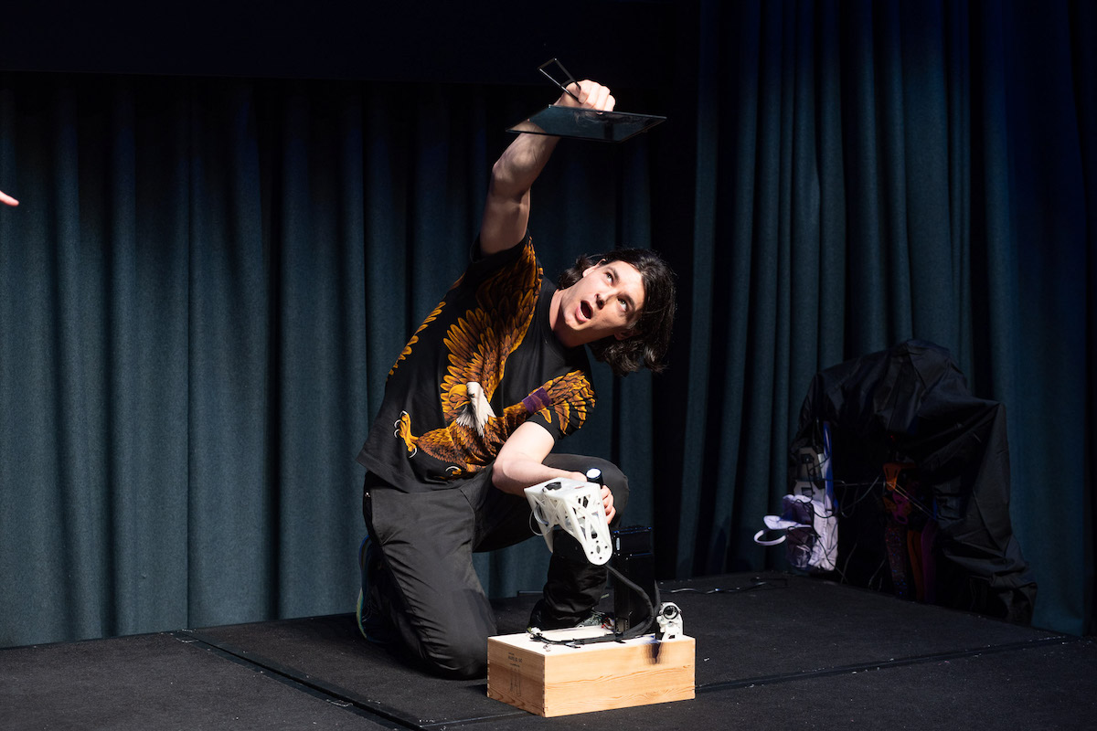 Aquila co-founder Nelson Smith on stage at Startmate Demo Day