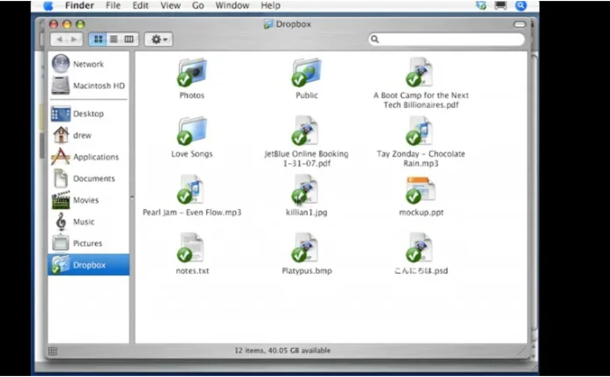 Early Dropbox interface showing a file system on a computer with various files and folders.