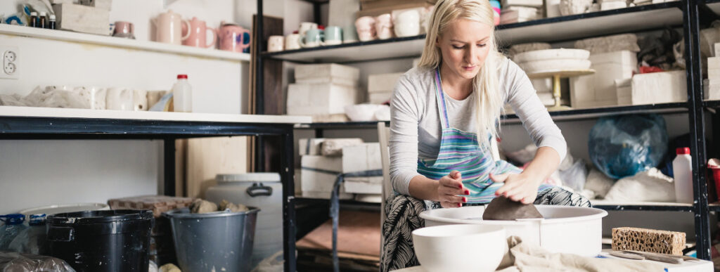Woman making a pottery: Xero Reports