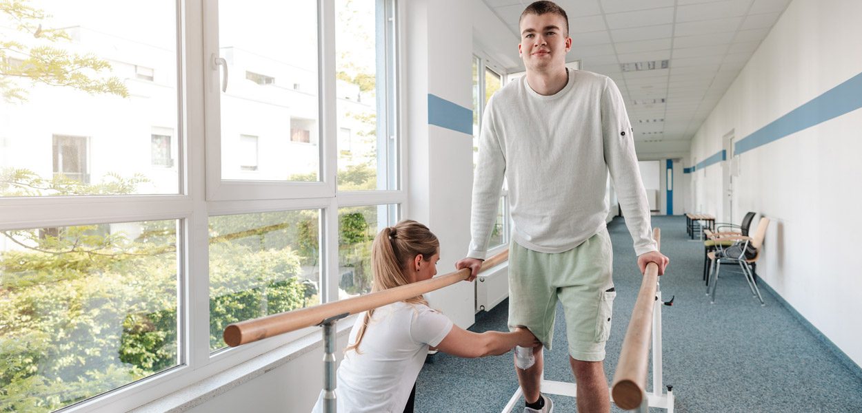 Athlete receiving rehabilitation after sports injuries