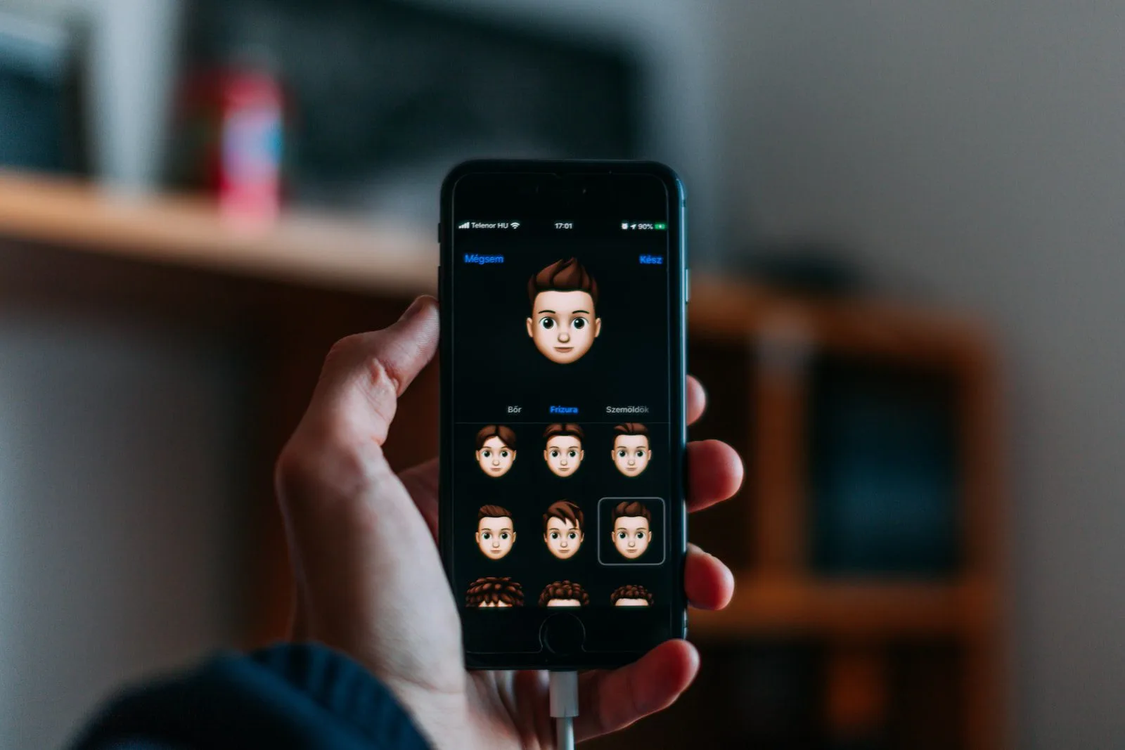 Dark Mode App Interface example. Memoji creation of an Apple user.