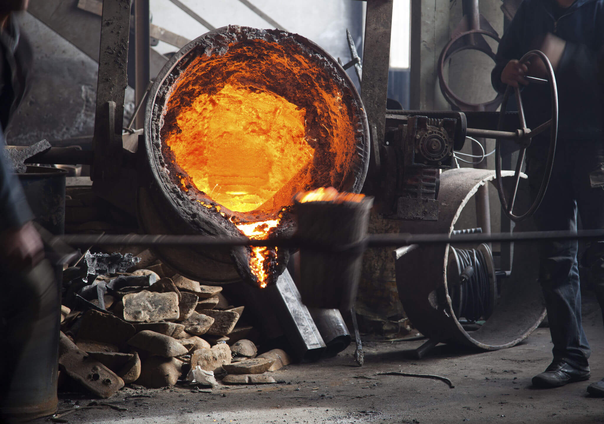 pouring of metal in investment casting