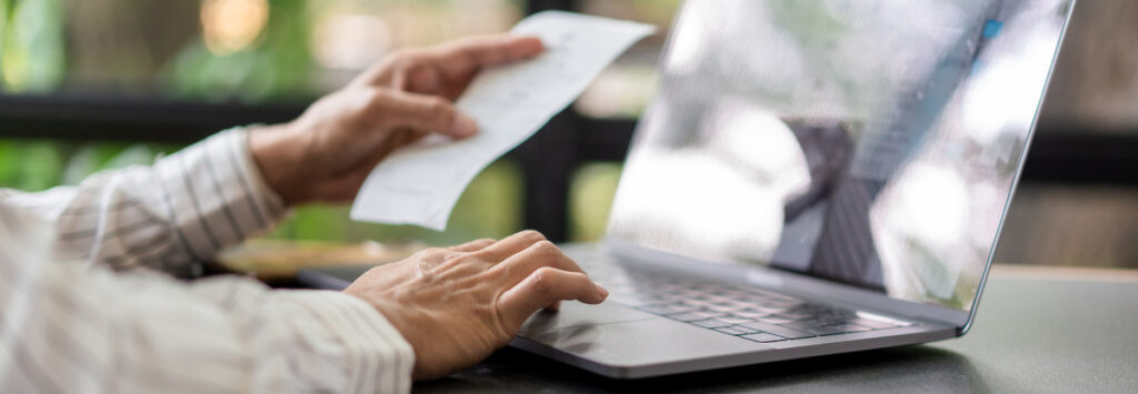 Person holds receipt checking expense: Unclaimed Property Issues