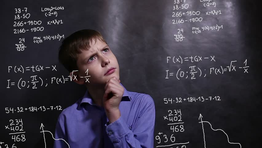 Student working on a complex math problem, deep in thought