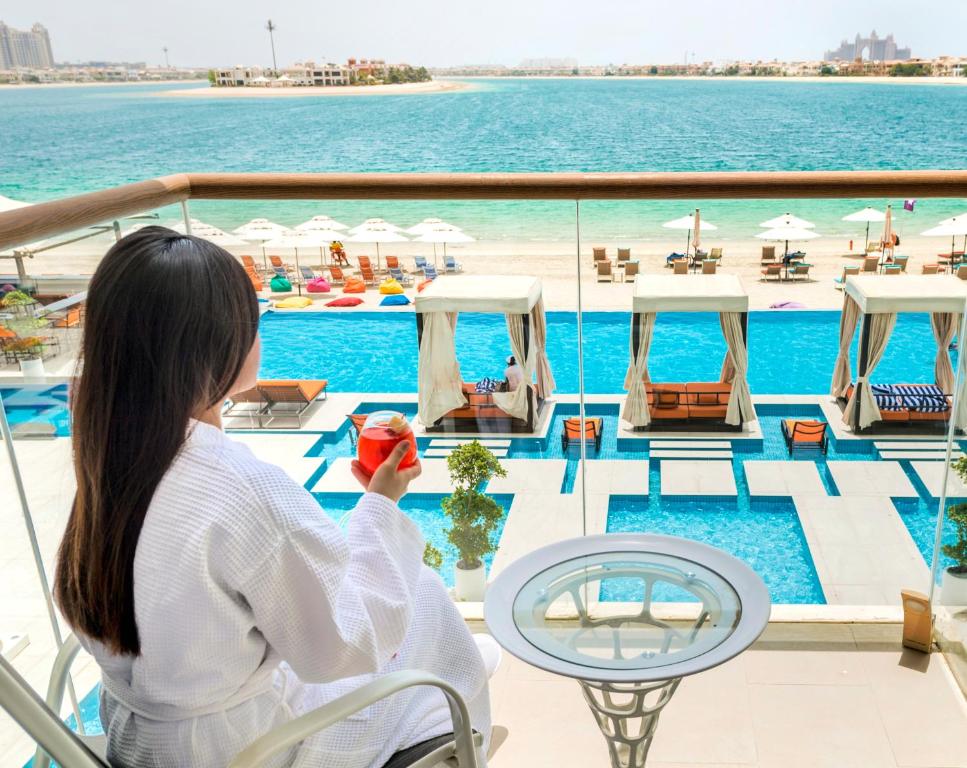 Luxurious beachfront resort with modern amenities at Royal Central Hotel and Resort The Palm