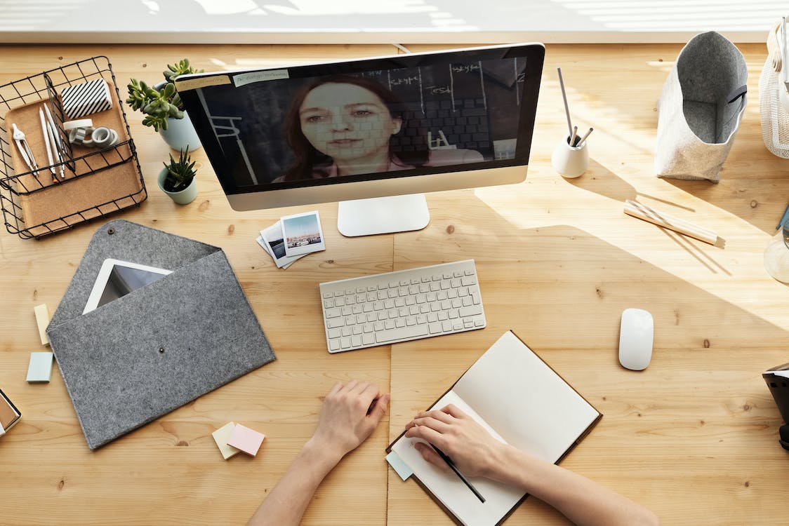 Free Person Writing on White Paper While Stock Photo