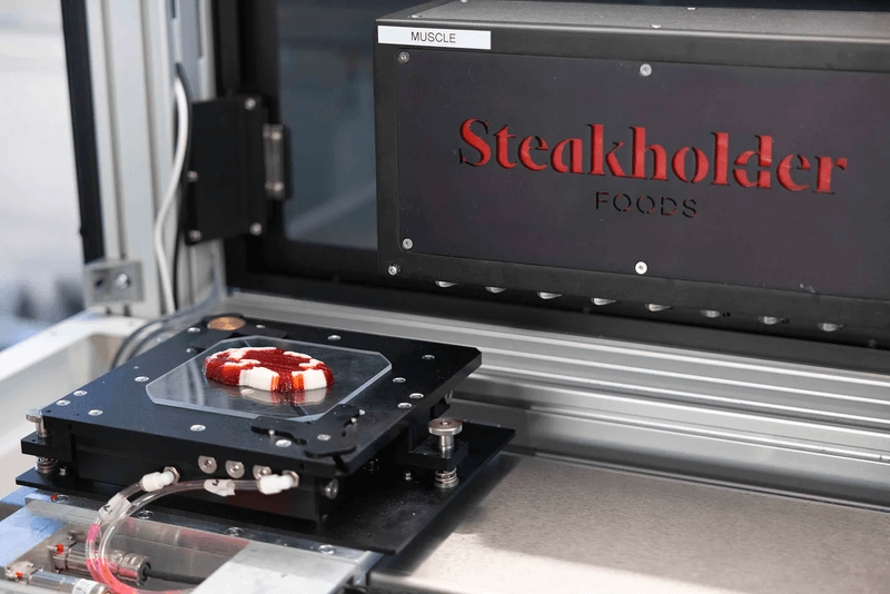 photo of food and beverage innovation by steakholder foods - a 3d printer of meat